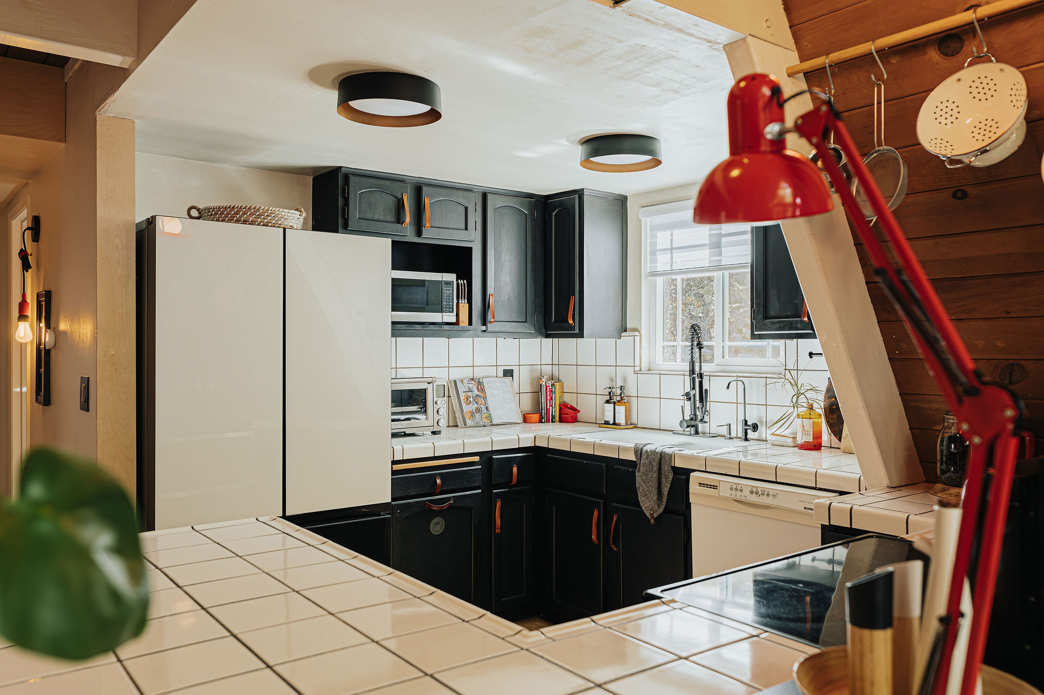 Bright, stylish kitchen with full appliances and cozy modern charm