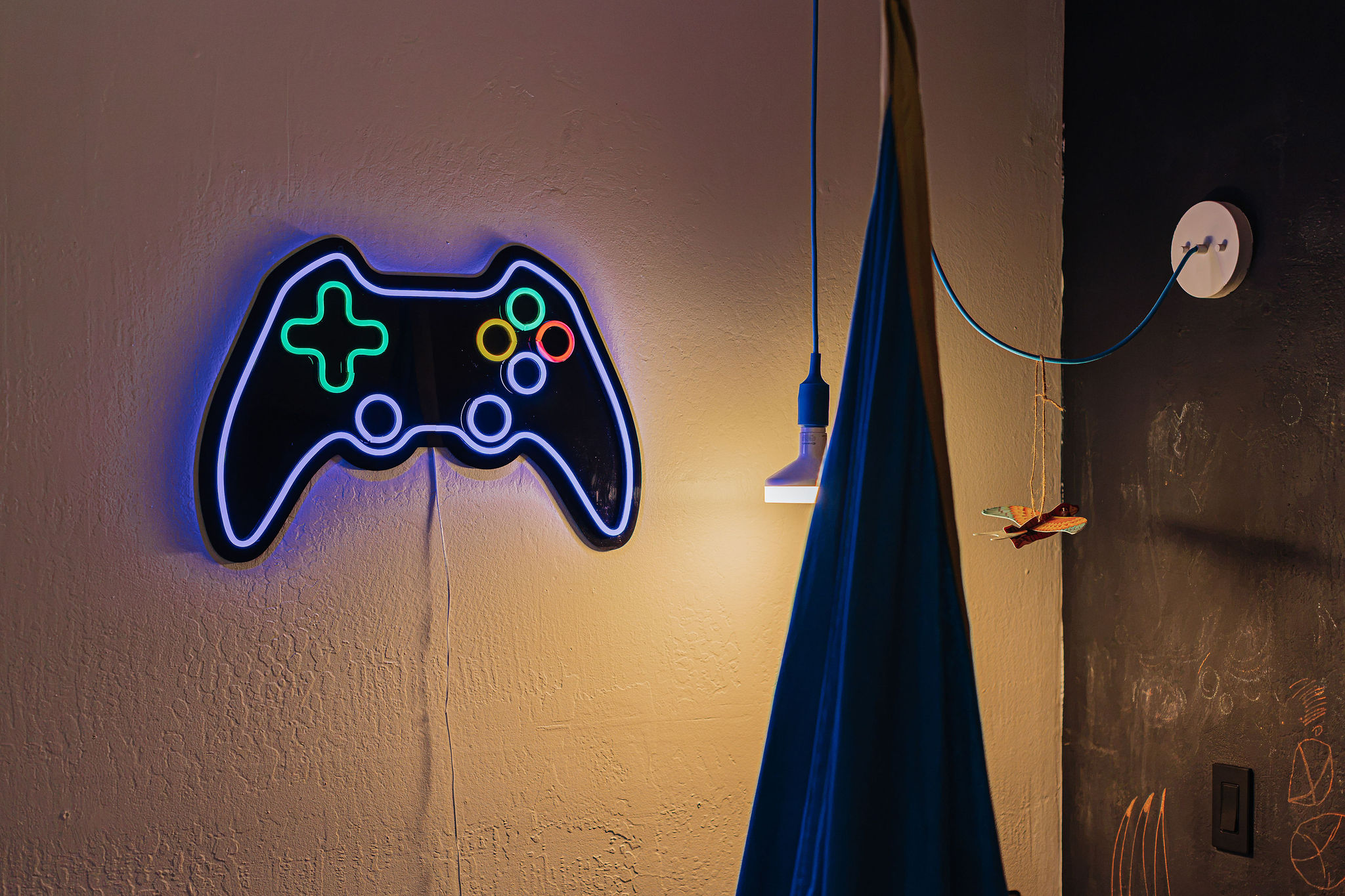 Fun gaming-inspired decor with cozy lighting and a stylish modern vibe