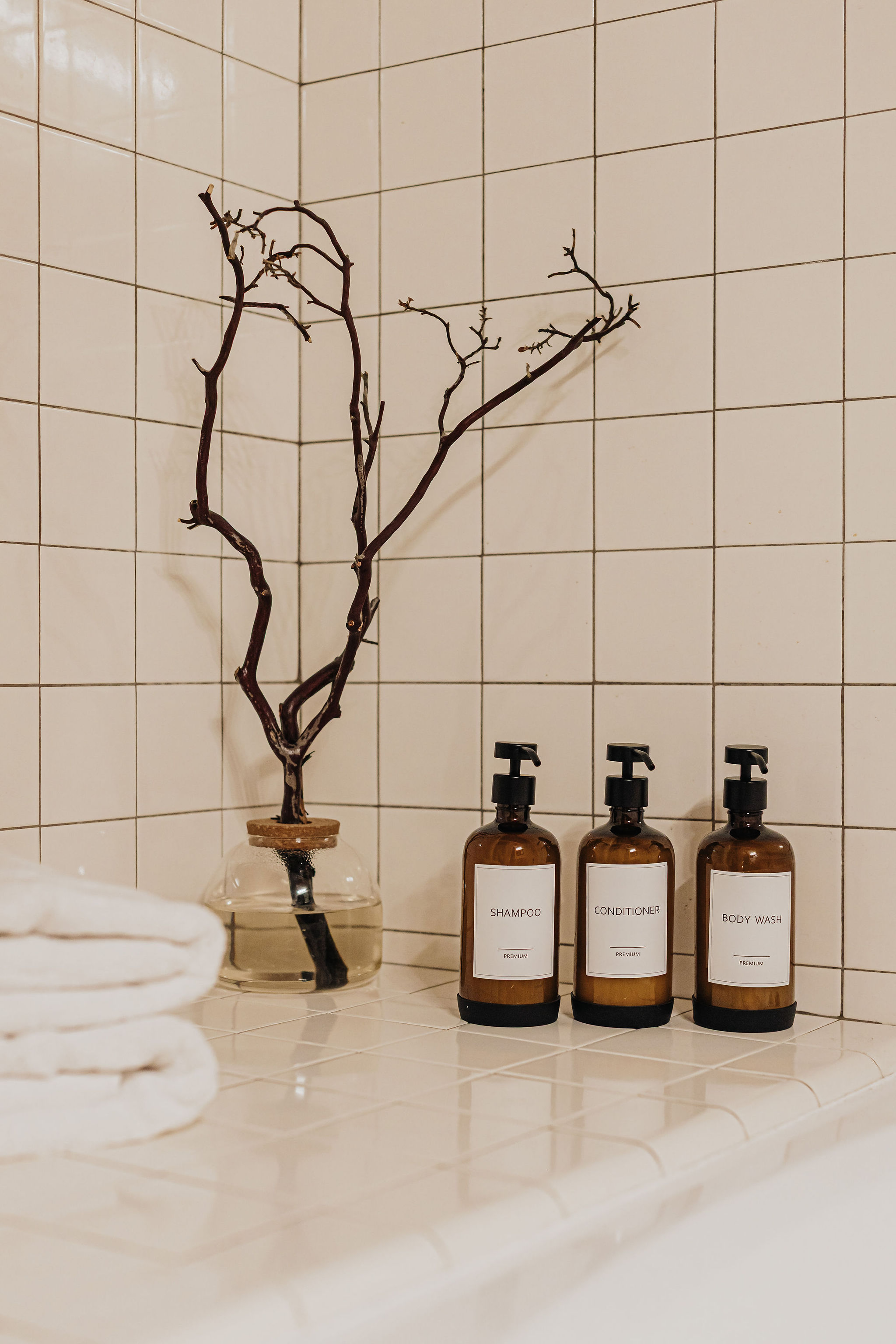 Spa-like shower with premium bath amenities and minimalist styling