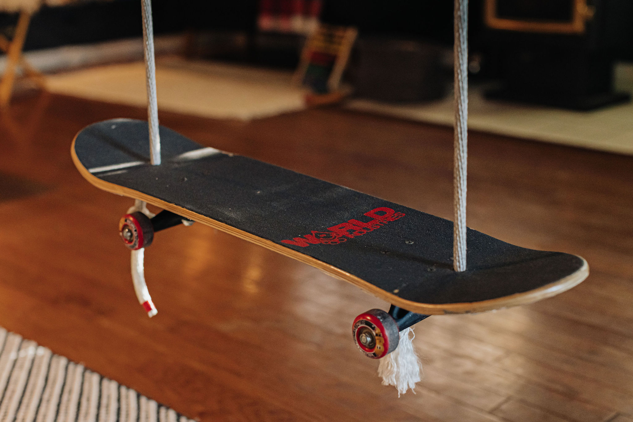 Playful skateboard swing adds a fun, creative touch to the space
