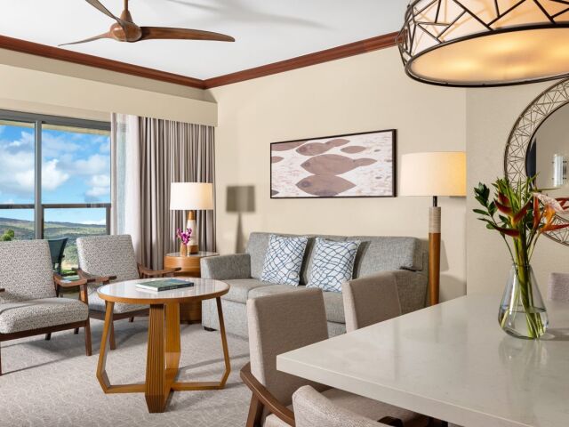 Bright, elegant living space with scenic views and modern island-style décor
