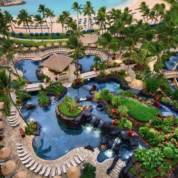 Tropical lagoon pools with waterfalls and direct beach access