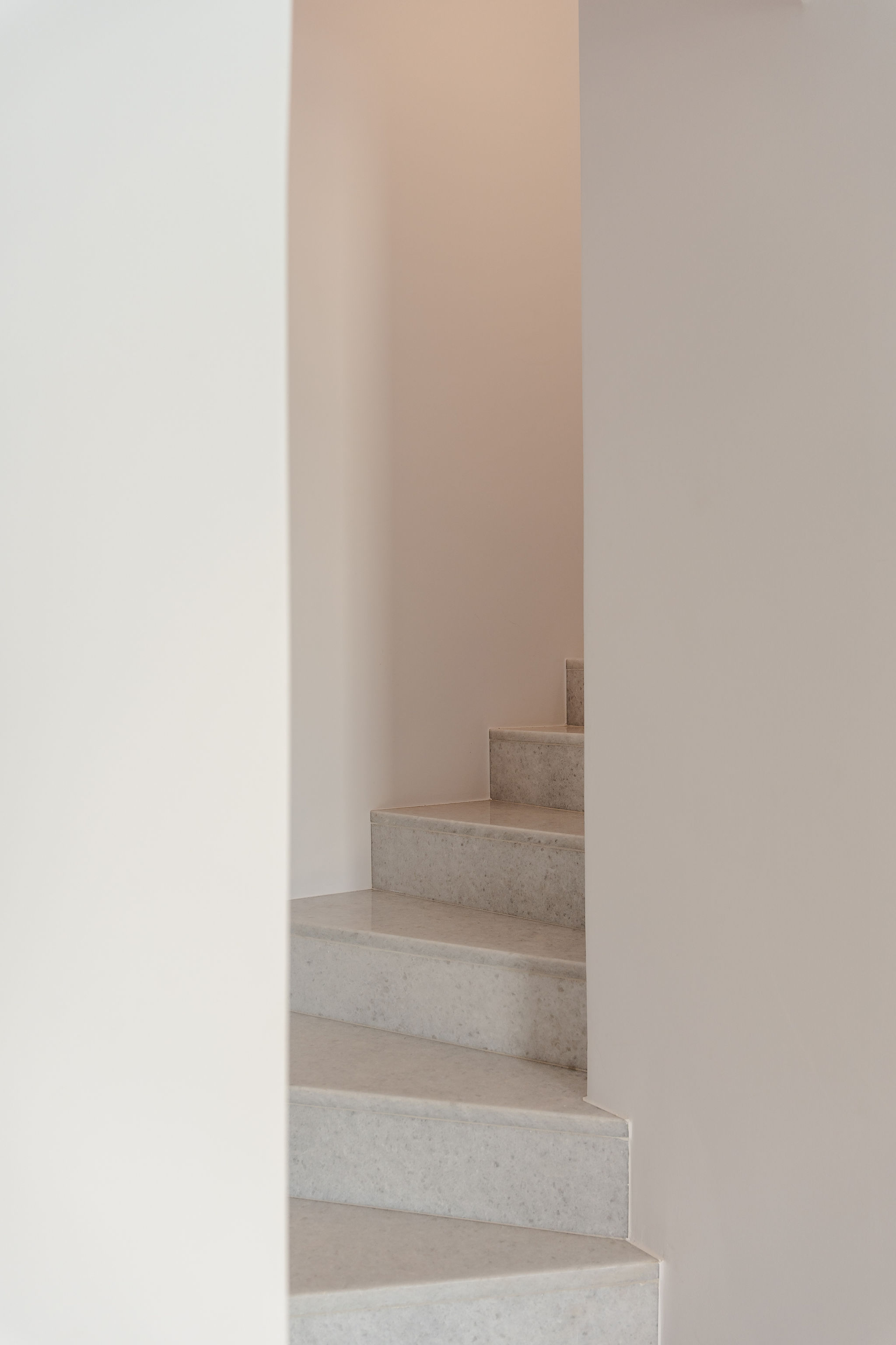 Minimalist stone staircase with clean architectural lines