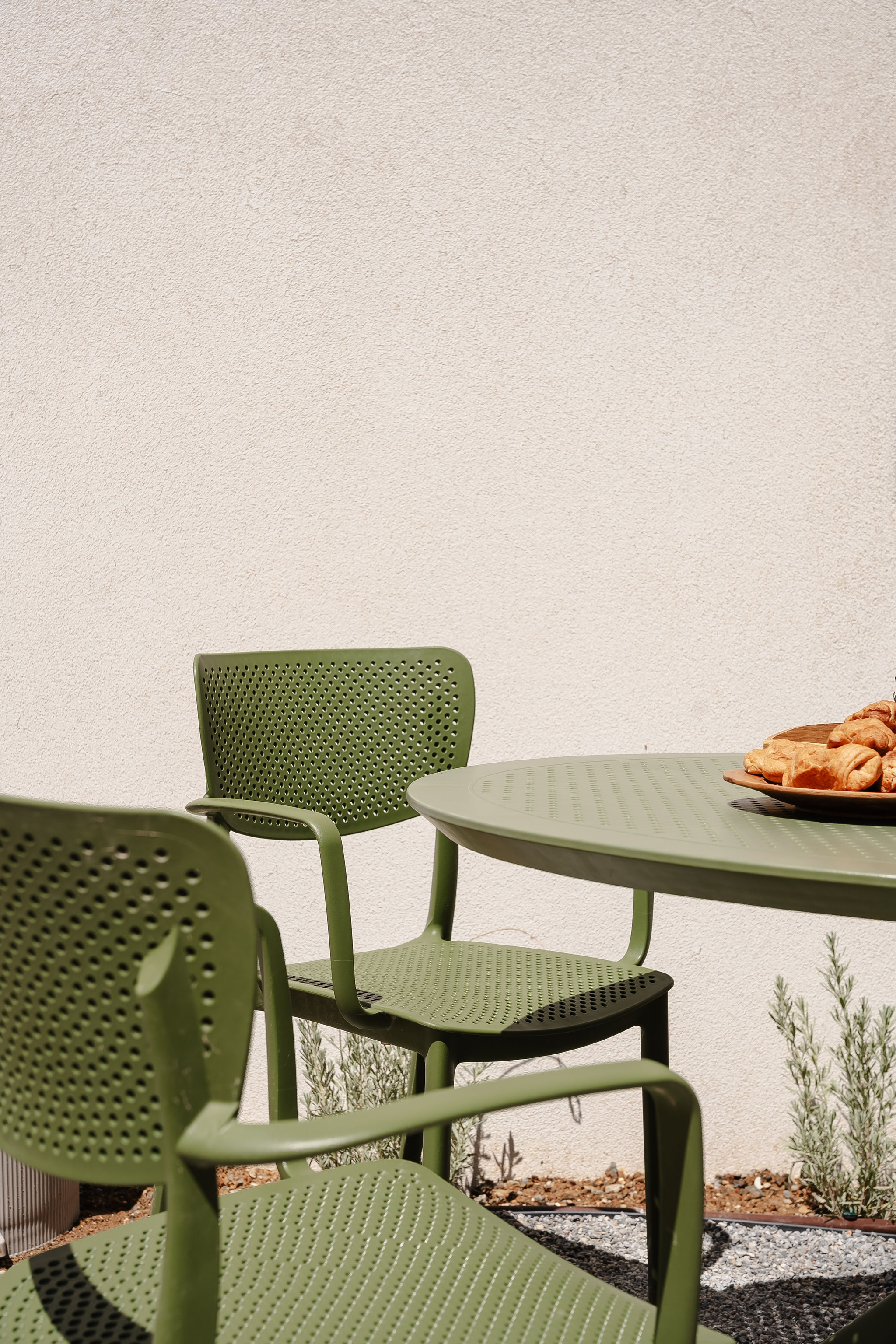 Cozy patio nook with modern seating for coffee and breakfast outdoors