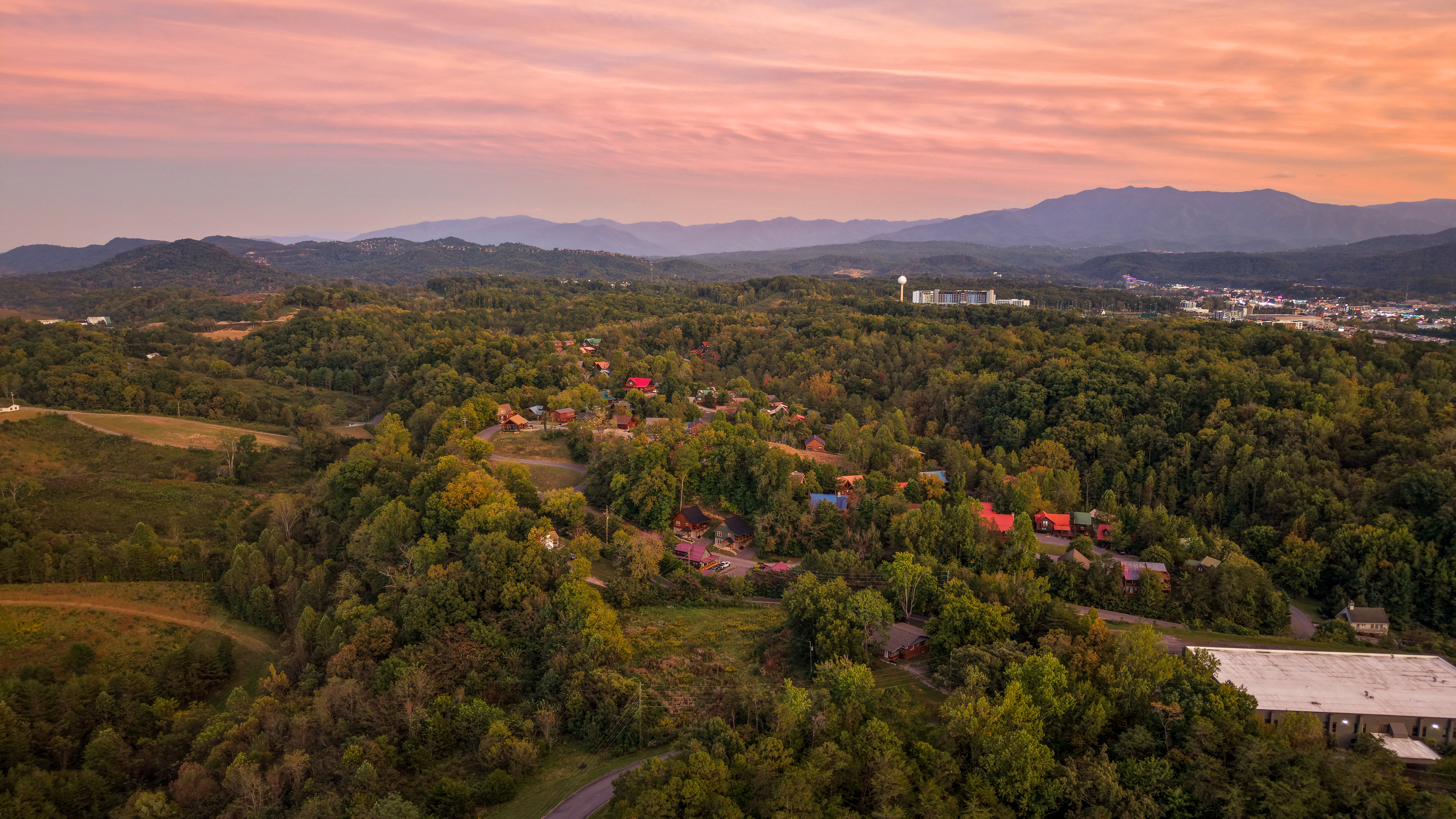 Peaceful mountain retreat with sweeping views and stunning sunset skies