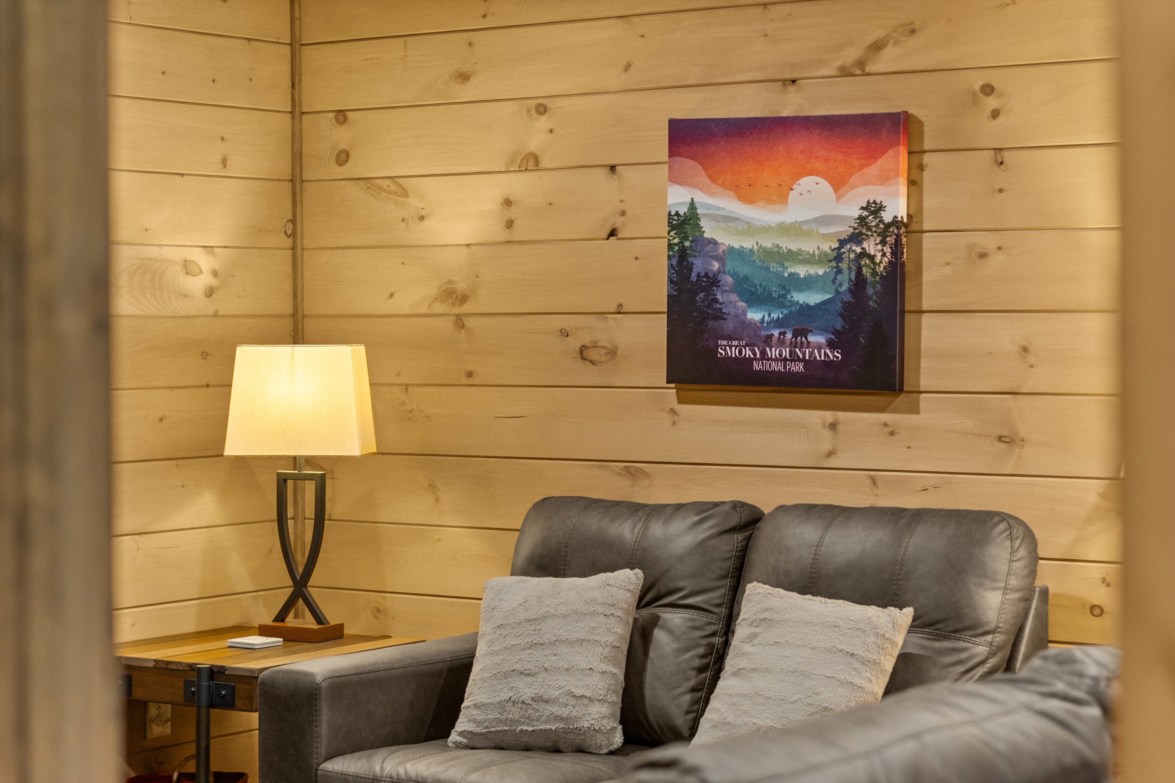 Cozy cabin lounge with leather seating and Smoky Mountains charm