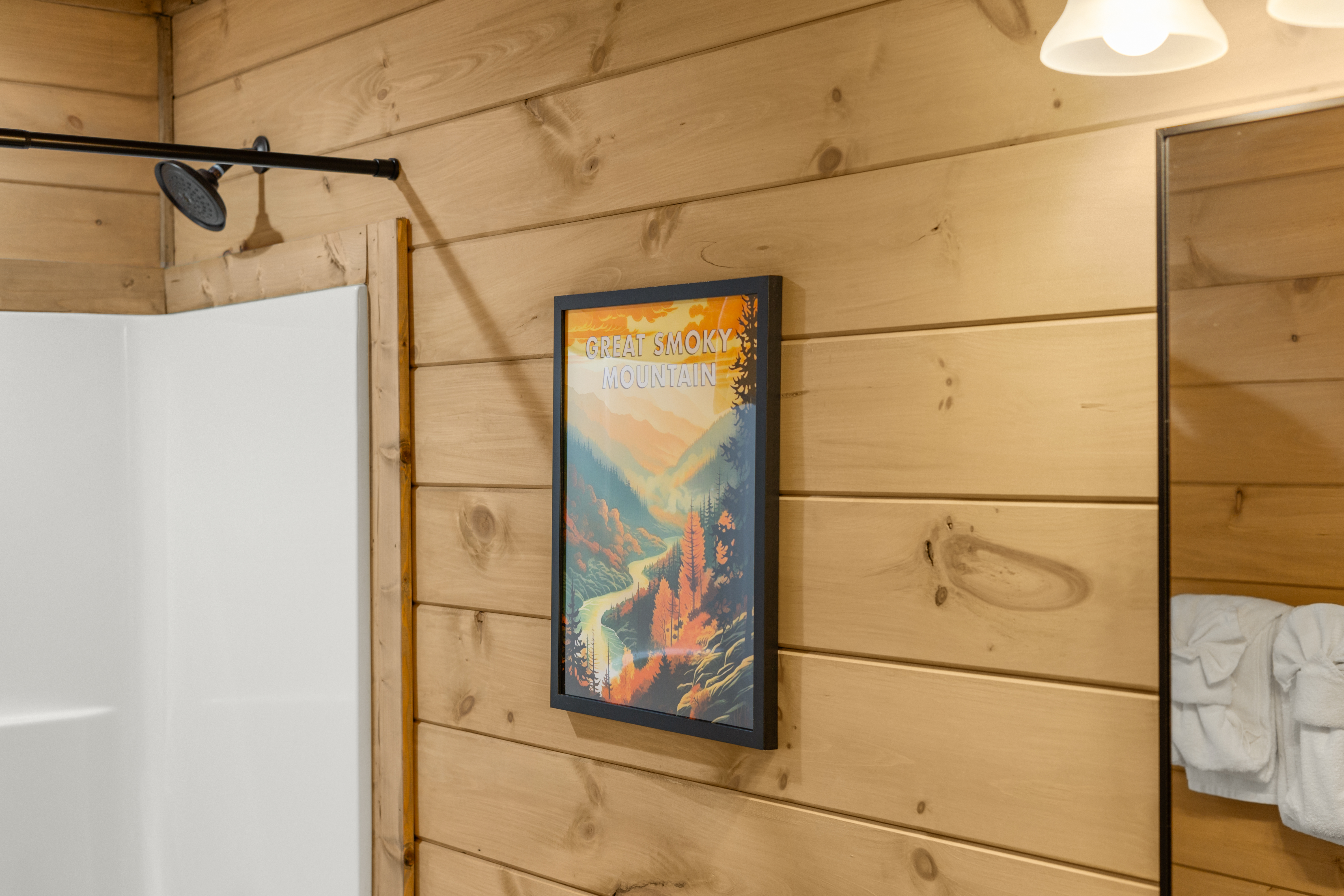 Cozy cabin bathroom with rustic wood walls and Smoky Mountain charm