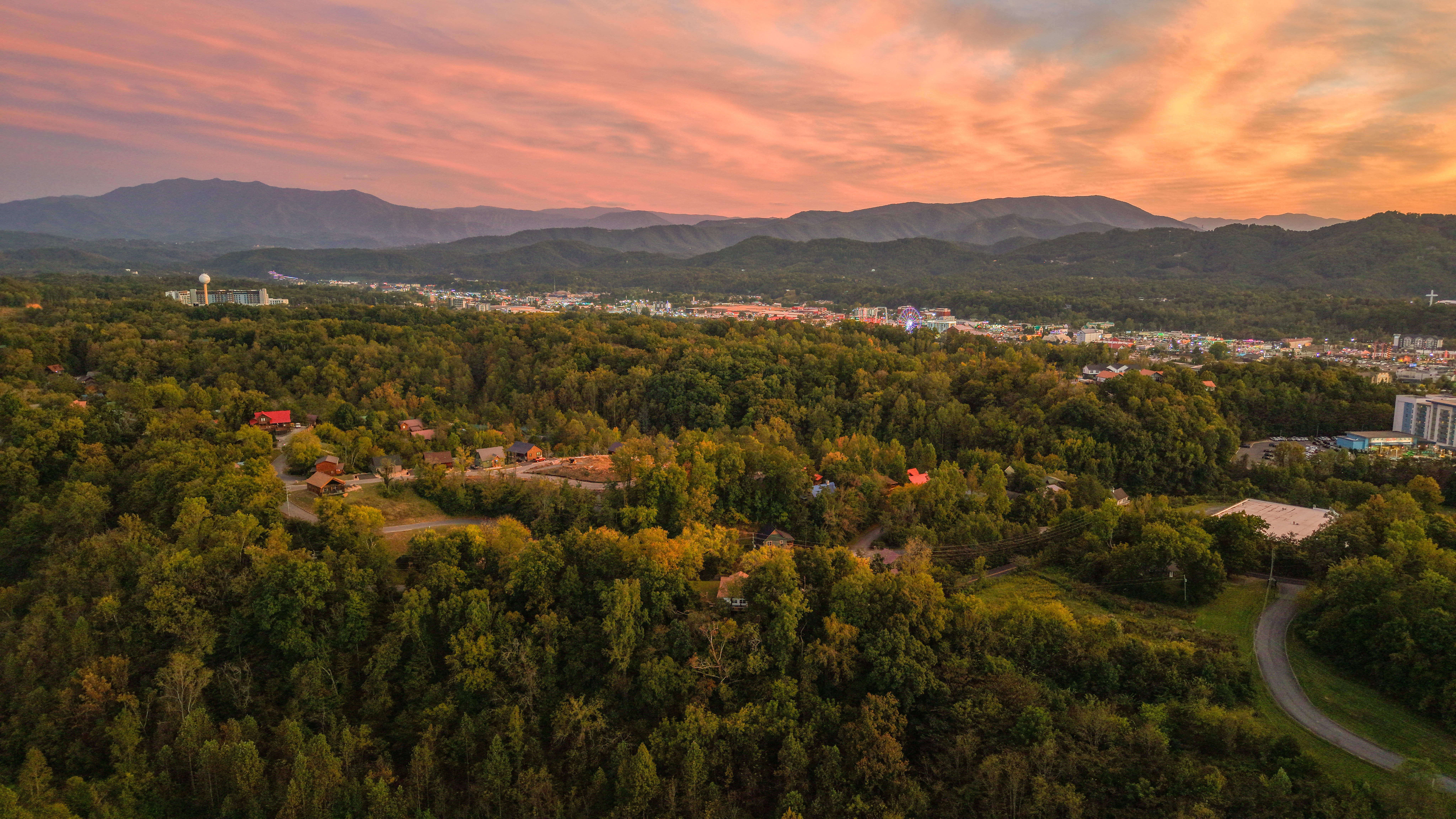 Stunning mountain sunset views over peaceful, tree-filled surroundings