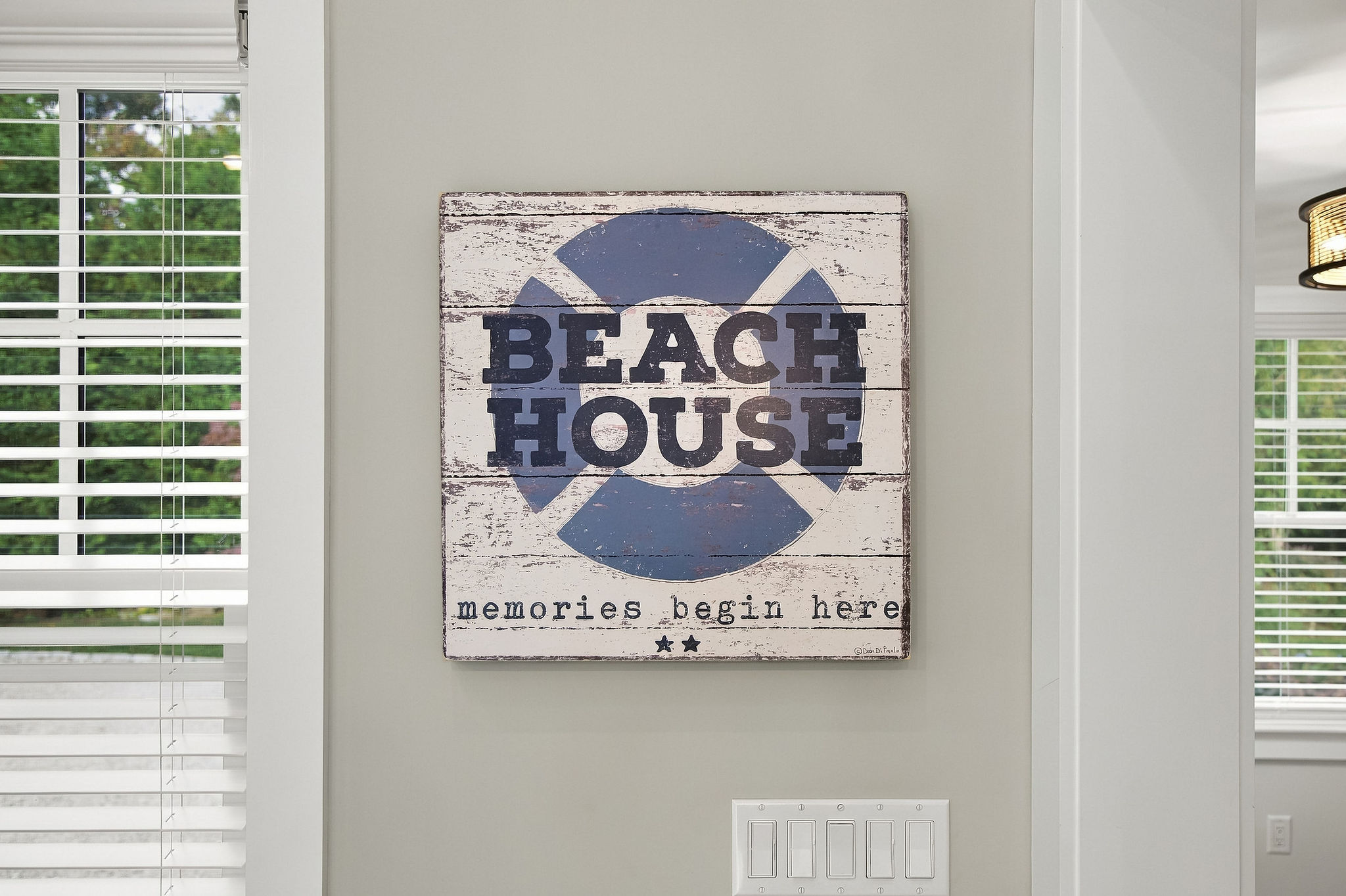 Coastal decor and bright natural light set the perfect beach house vibe