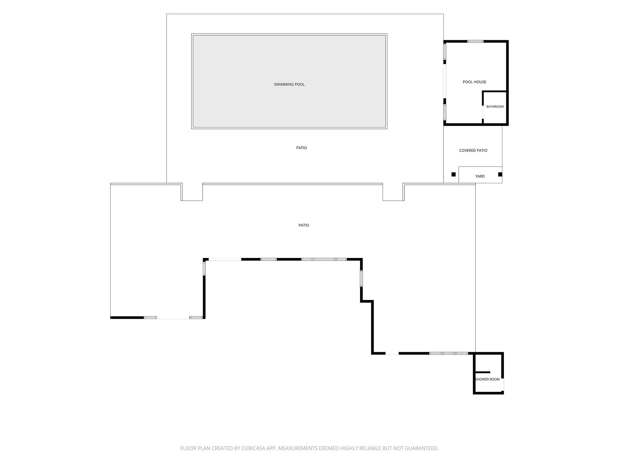 Large pool, pool house, and expansive patio for outdoor entertaining