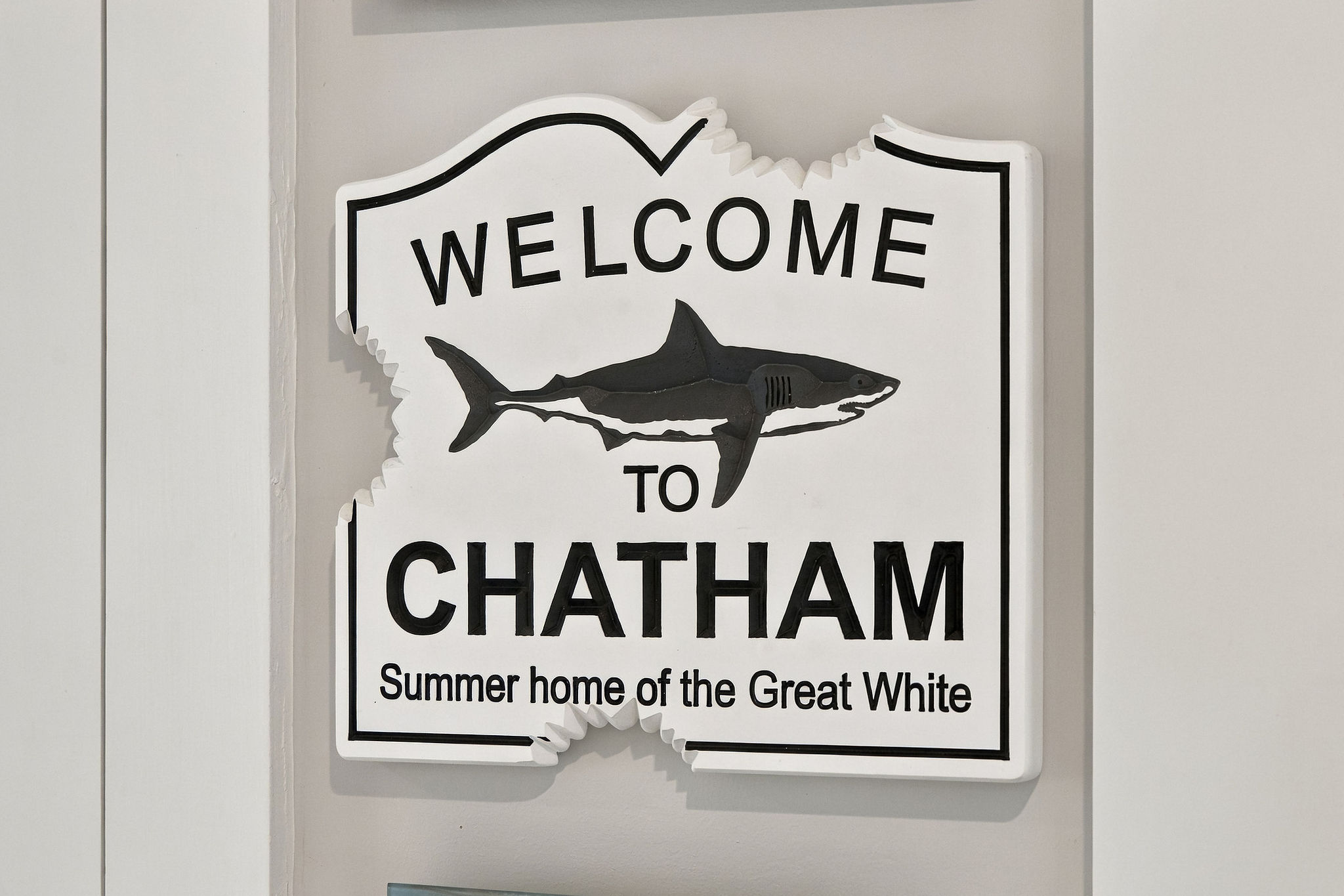 Coastal Chatham decor with a fun local welcome sign