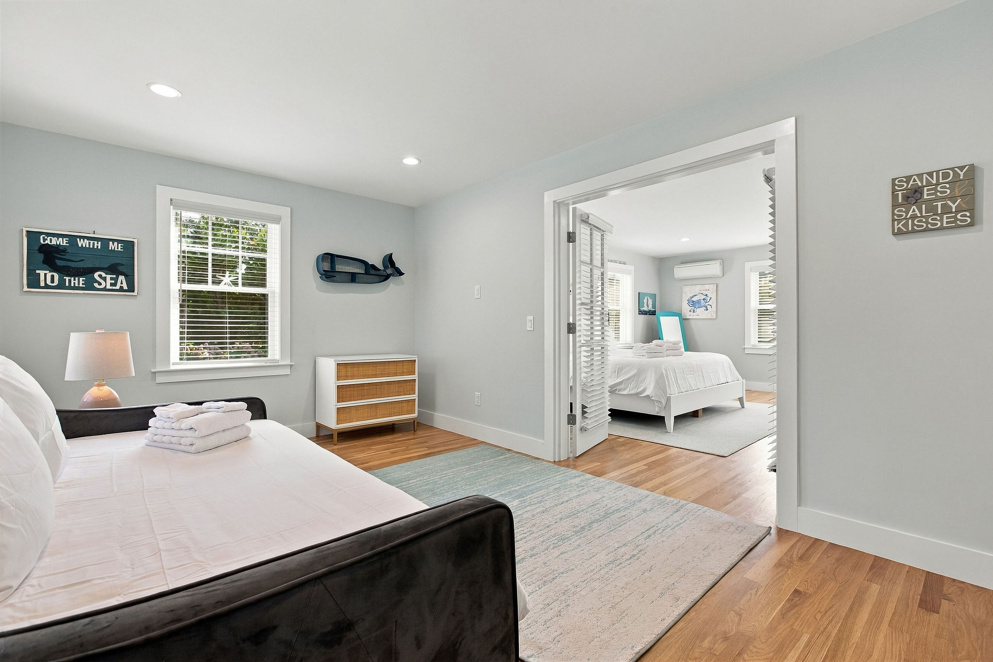 Bright coastal bedroom suite with airy layout and natural light