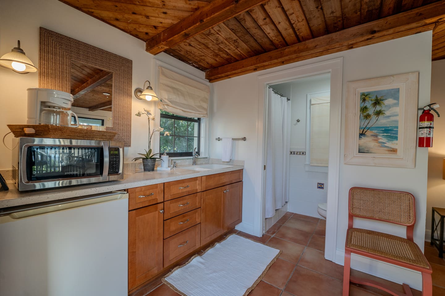 Kitchenette with mini fridge, coffee maker and ice maker
