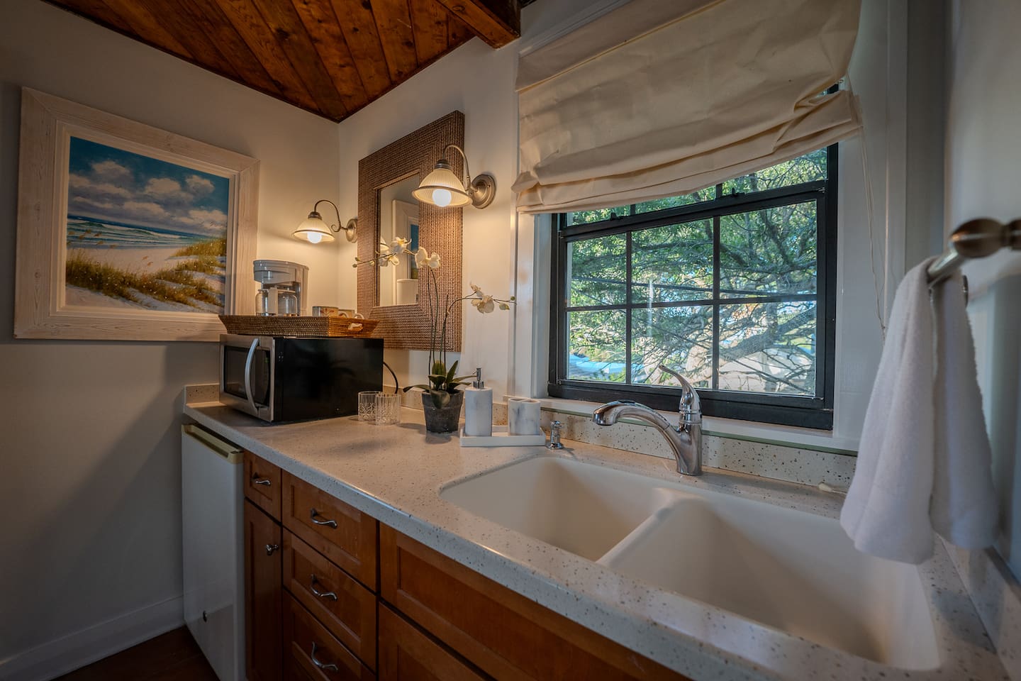Cozy kitchenette equipped with mini fridge, coffee and microwave