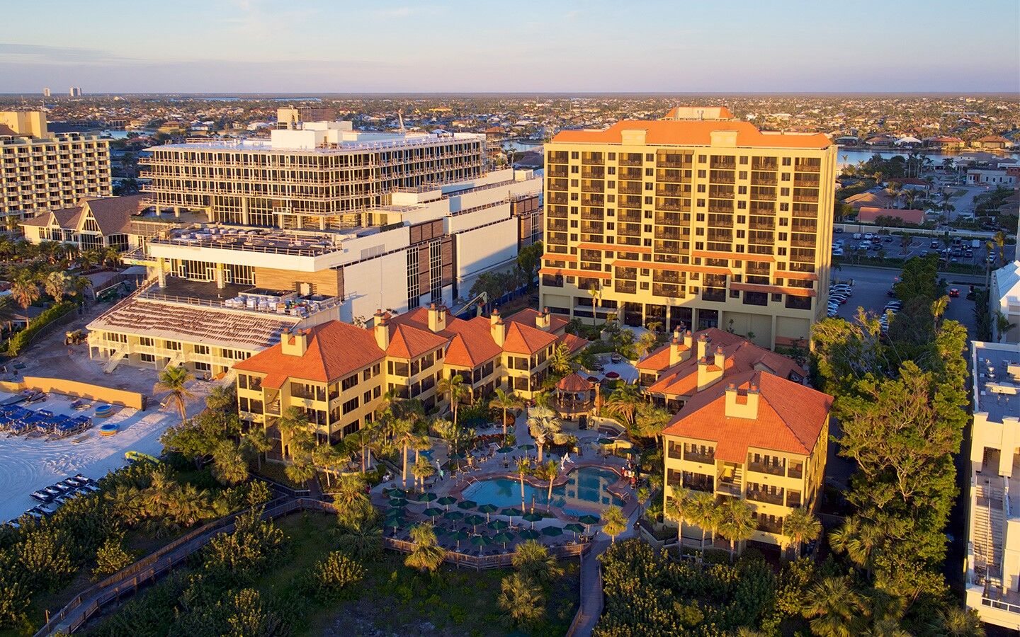 Aerial view of a tropical resort oasis near the beach