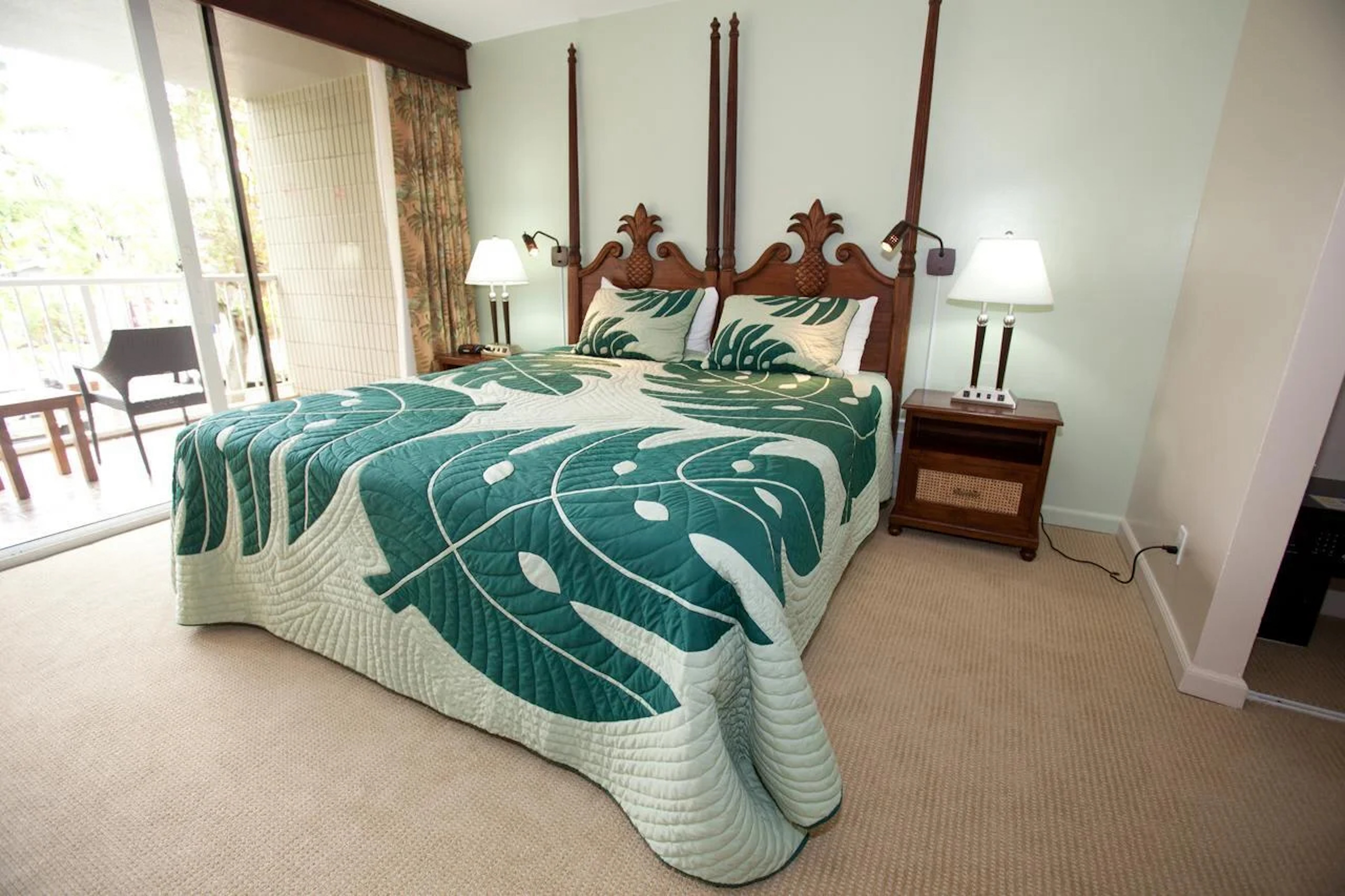 Bright tropical king bedroom with private balcony and elegant island style