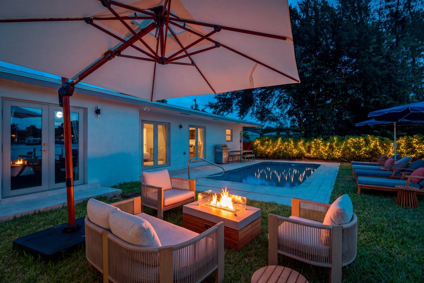 As the sun fades, the string lights begin to glow. The perfect time to slow down, take a dip, and enjoy the peaceful evening.