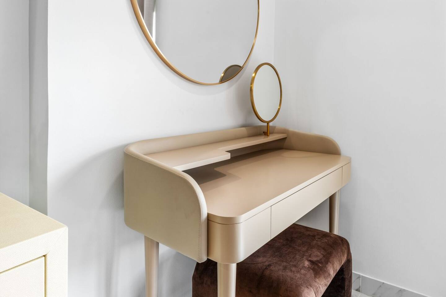 Along with the comfortable king-size bed, it also features a practical vanity area for getting ready throughout your stay.