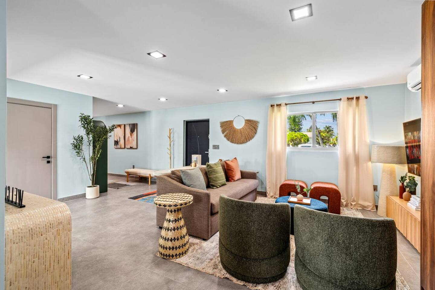 This living room offers a comfortable place to gather, relax, and spend time together.