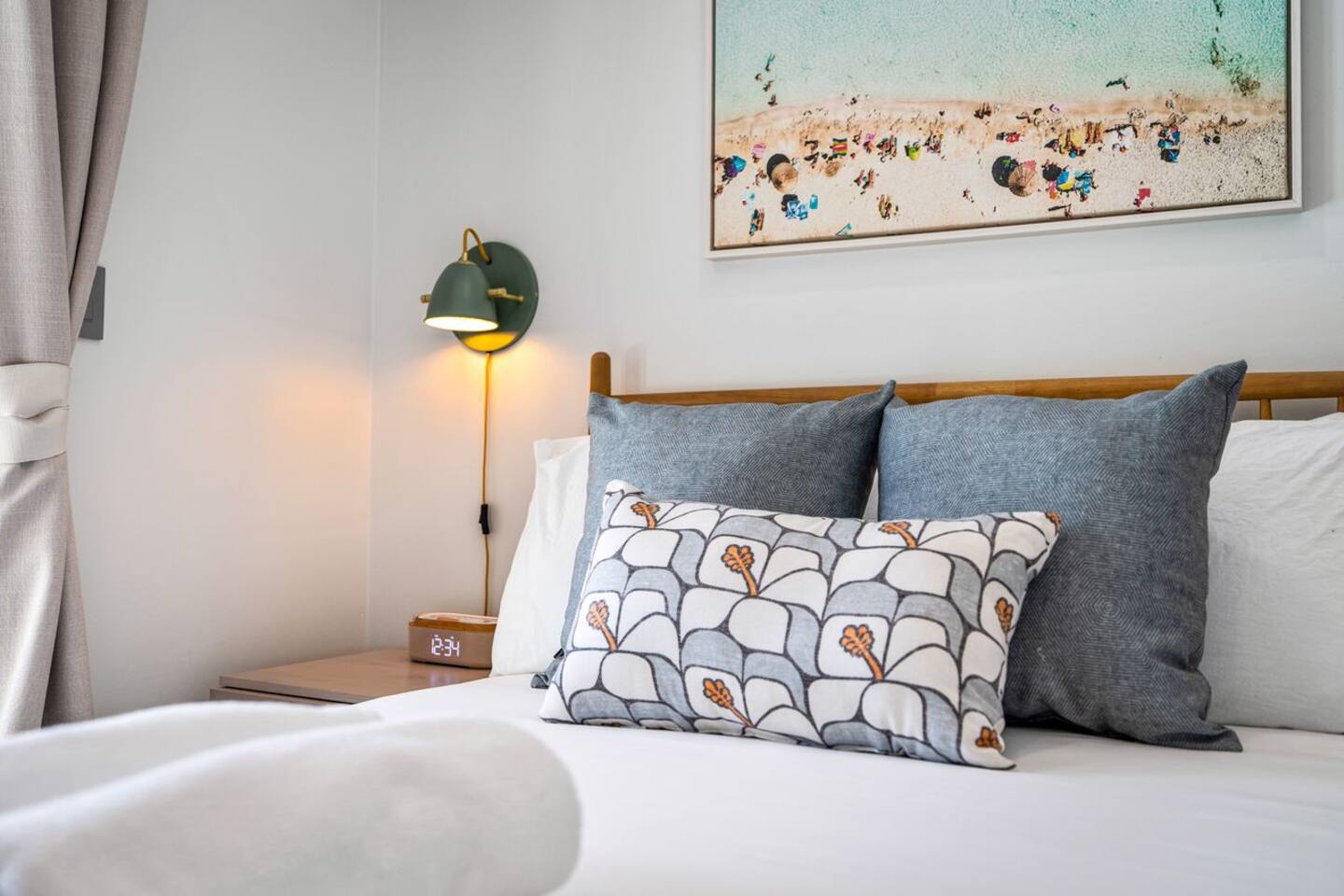 Small touches add to the comfort of Bedroom 2, including a bedside lamp that creates a warm and inviting feel after sunset.