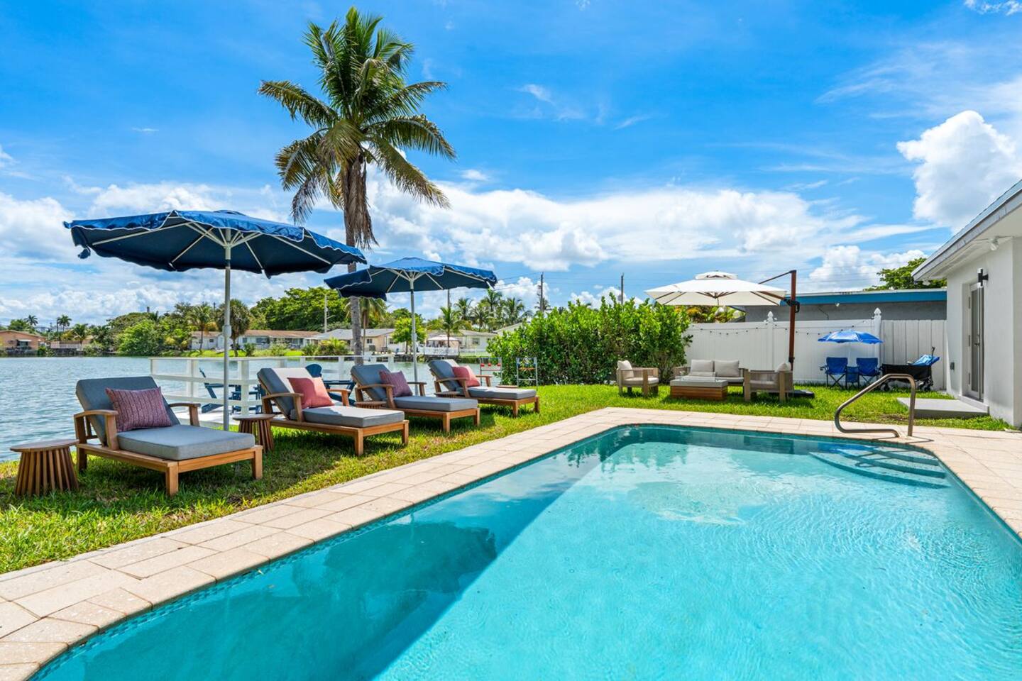 Enjoy a private pool area with comfortable seating, perfect for relaxing, soaking up the sun, and enjoying time with family and friends.