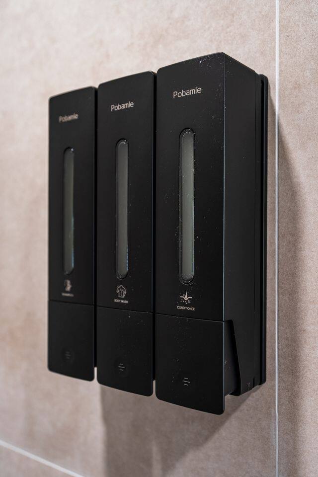 Find your shower essentials right where you need them, with wall-mounted containers.