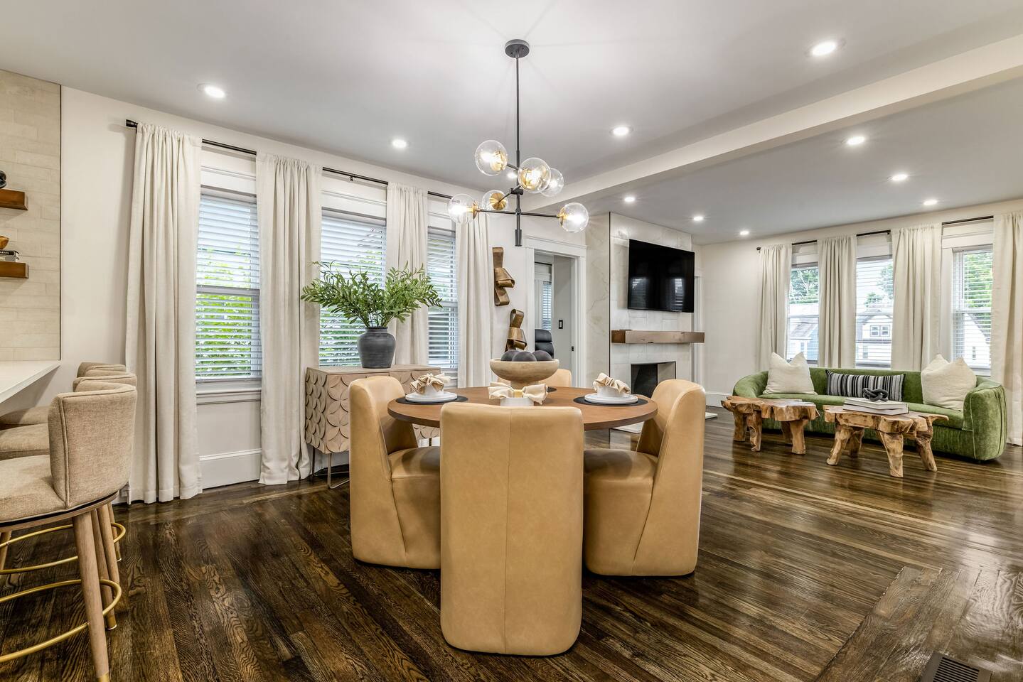 Elegant dining area with seating for four and an open-concept layout.