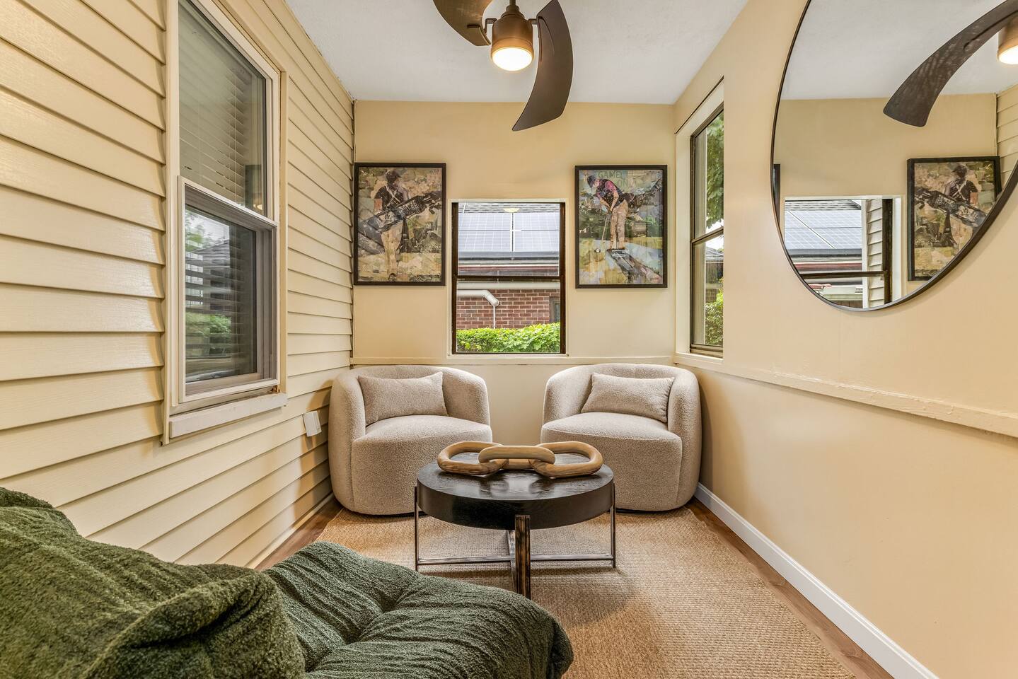 Bright sunroom with comfortable lounge seating-perfect for reading, relaxing, or enjoying your morning coffee.