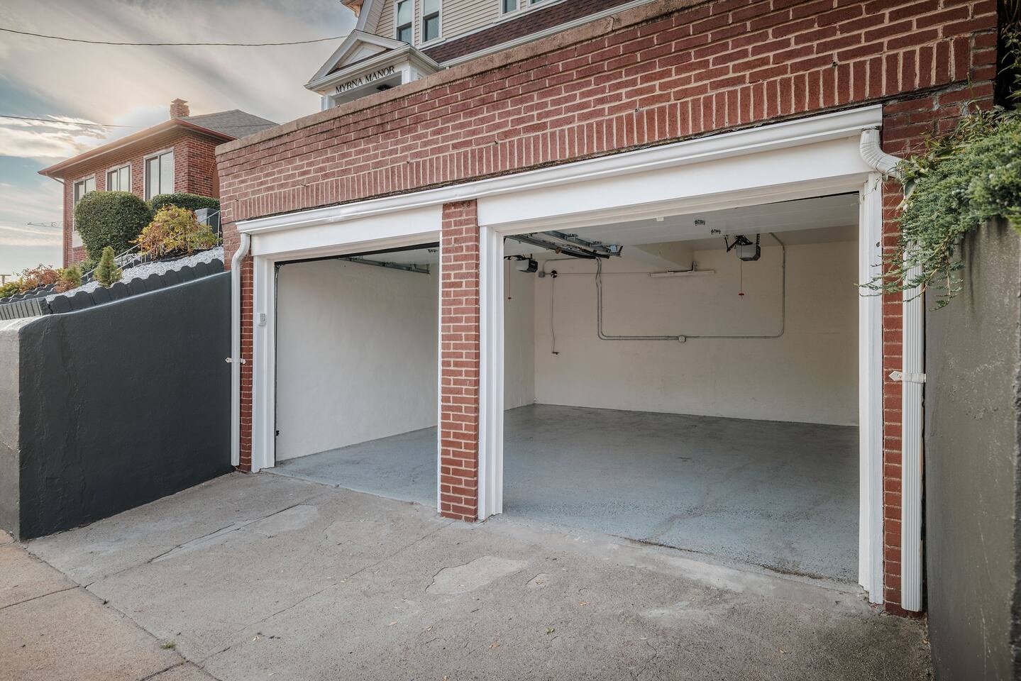 Private garage parking with one reserved space for guest use.