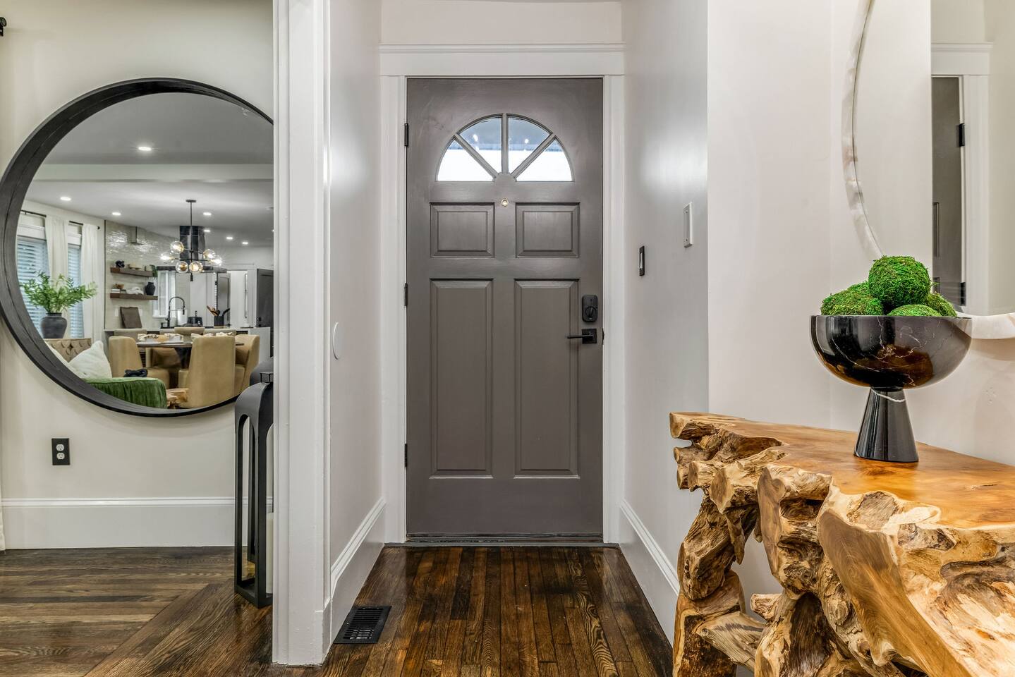 Welcoming entryway with designer decor and convenient keypad entry.