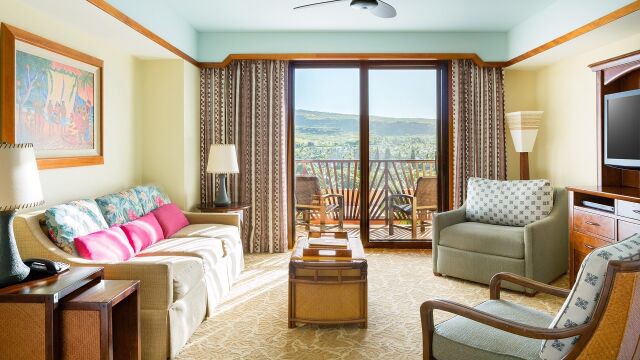 Bright lounge with private balcony and stunning scenic views