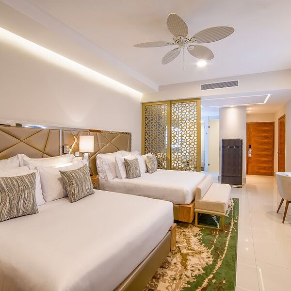 Spacious double-queen room with modern design and elegant comfort