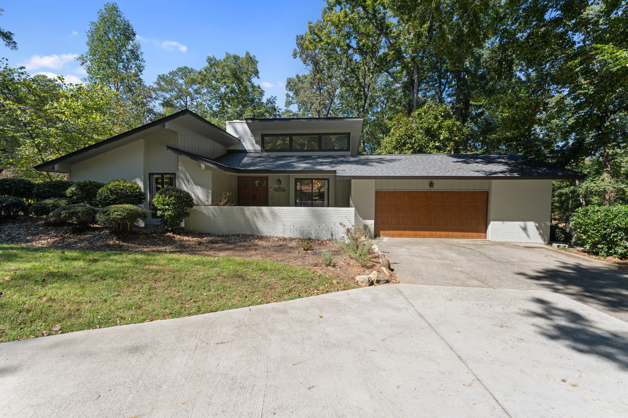 Modern lines embrace the woods: this is where contemporary design meets the wild landscape beyond.