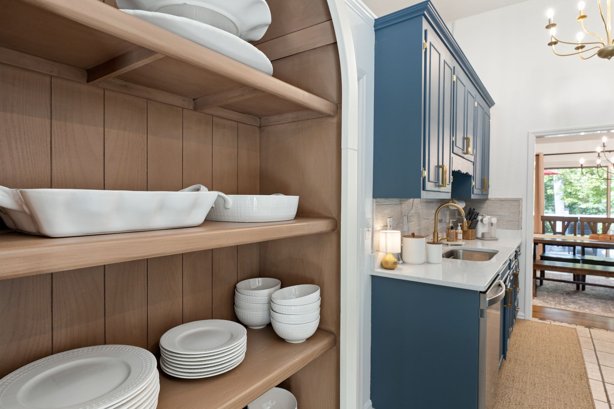 A butler's pantry ready for entertaining: vintage-worthy dishware, polished surfaces, and the details that make hosting effortless.