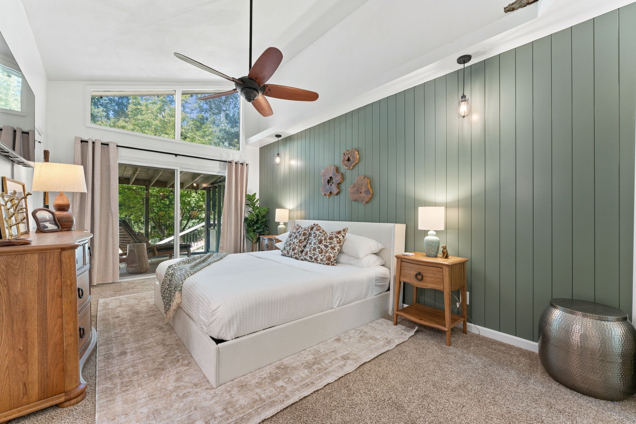 Wake to forest views and sage green serenity, where every detail whispers rest.