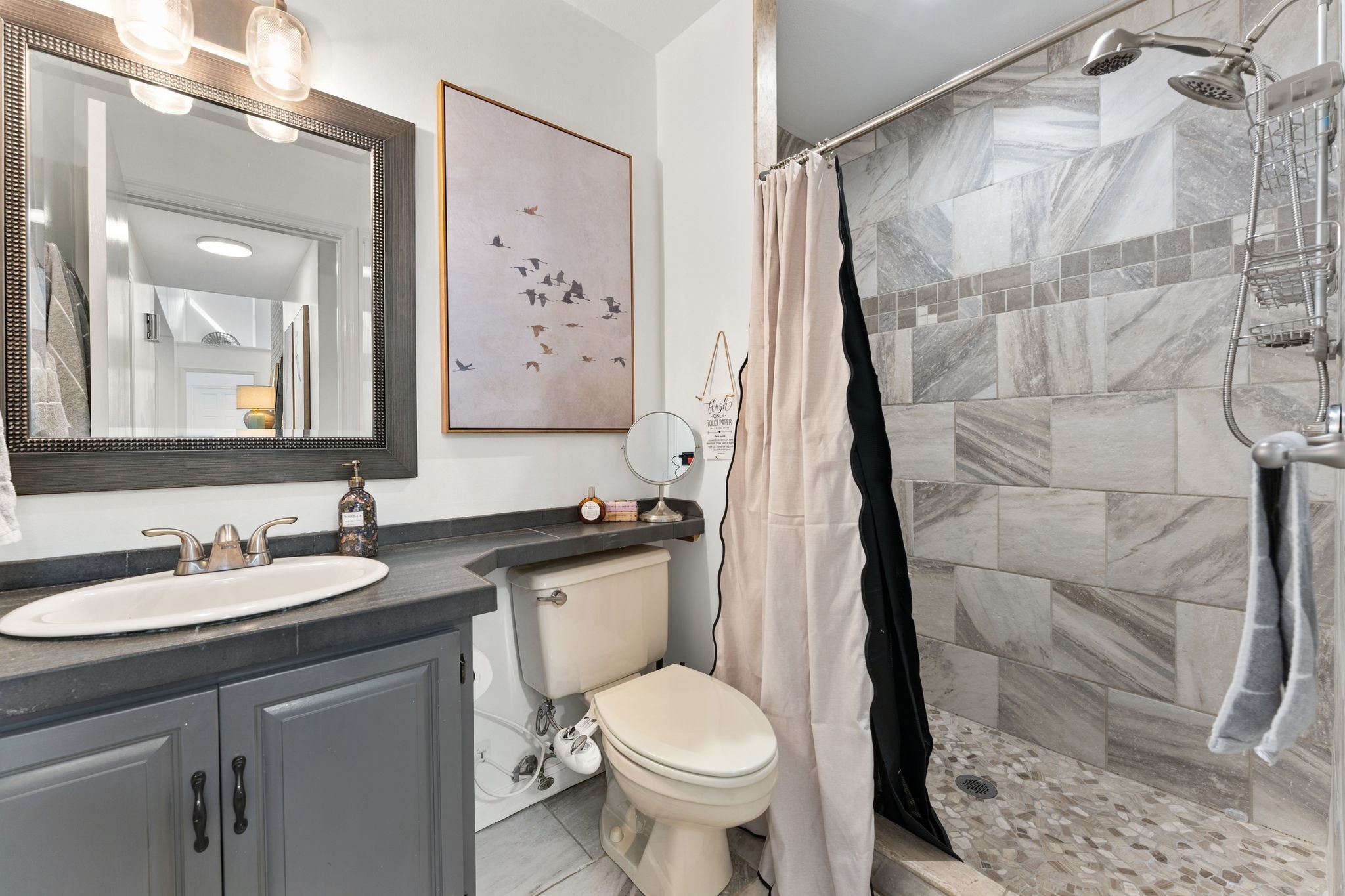 Spa-like bathroom with walk-in tiled shower and dual showerheads