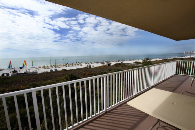 Spacious beachfront balcony with stunning Gulf views and outdoor seating