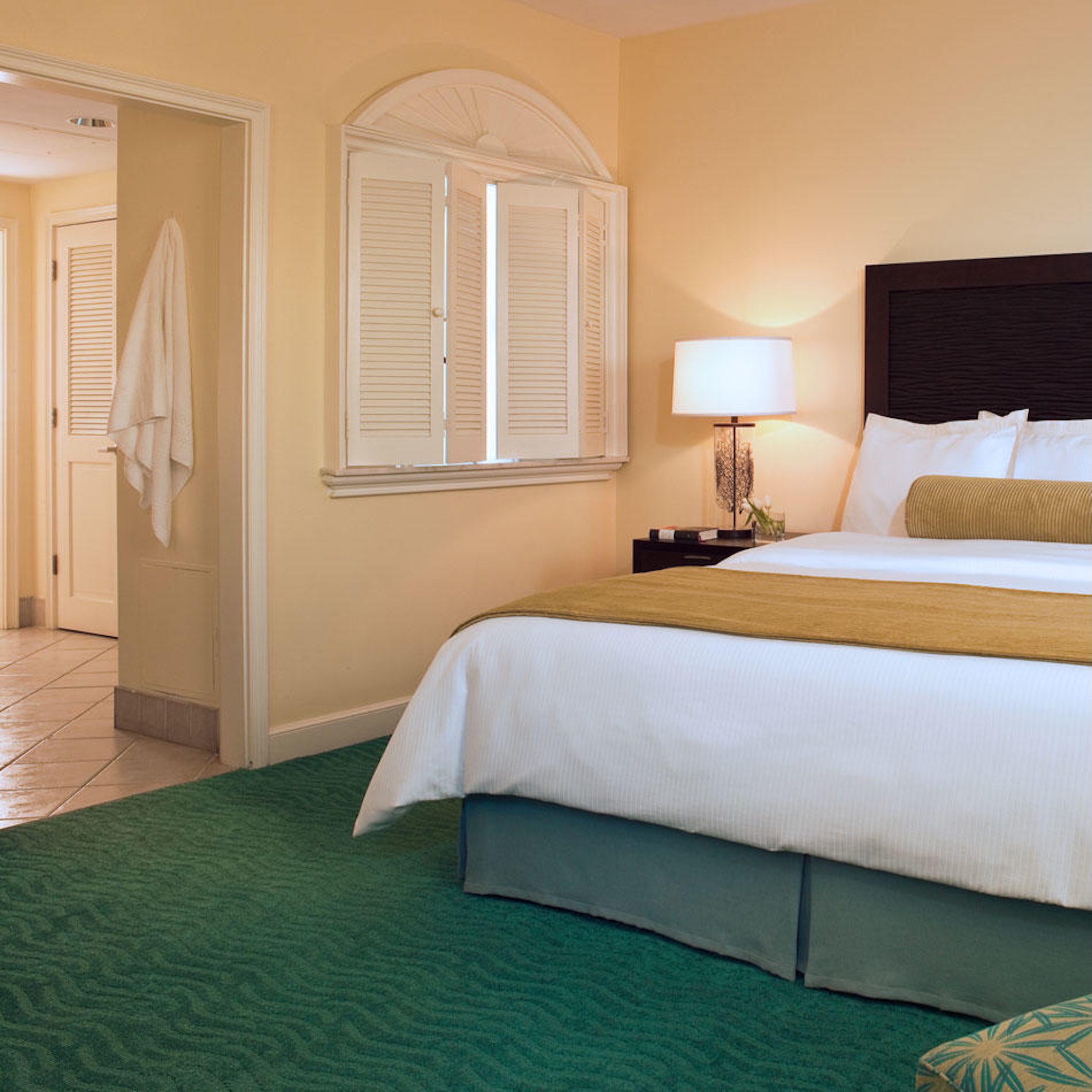 Bright, cozy bedroom with ensuite access and polished resort-style comfort