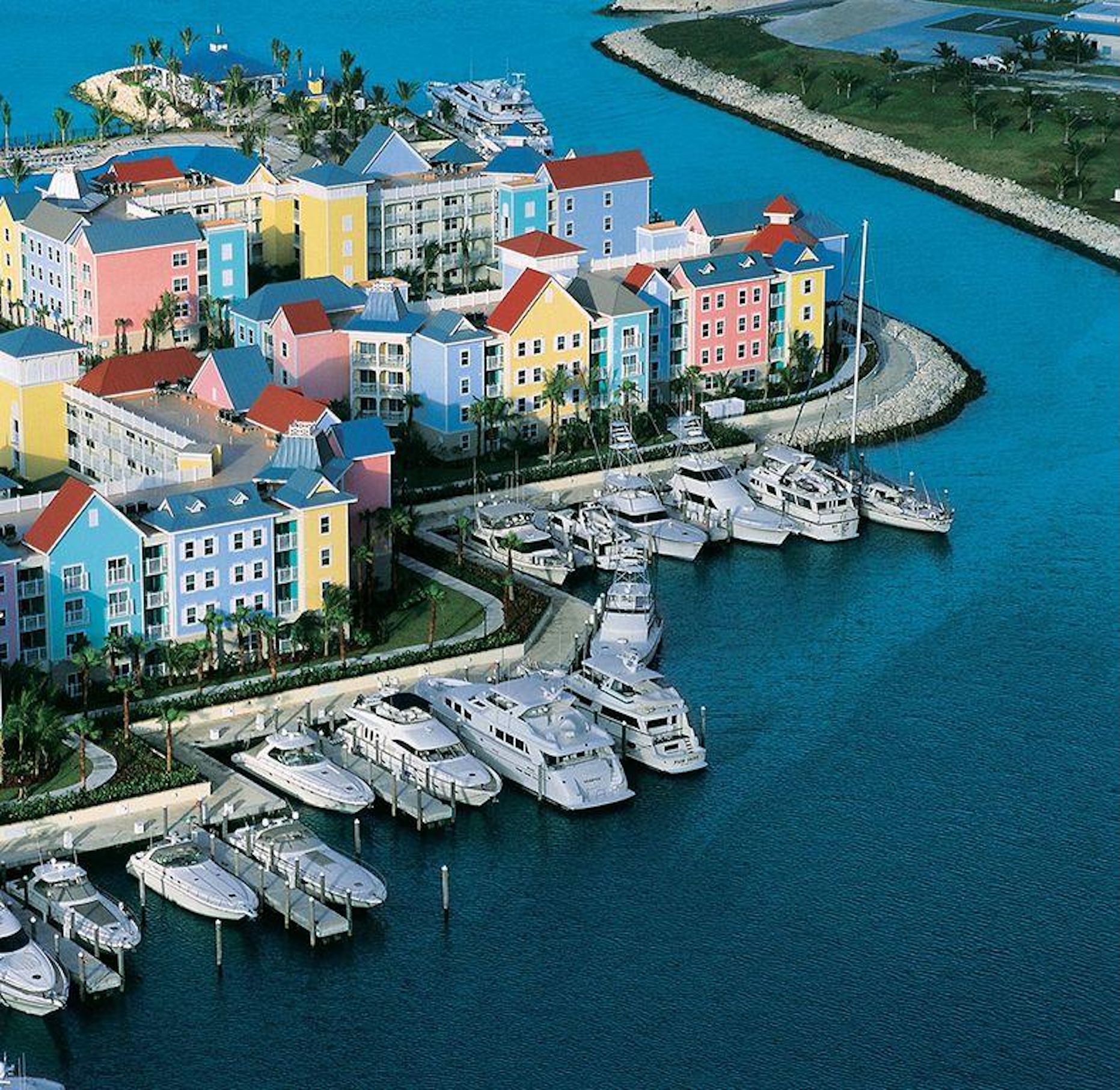 Colorful waterfront resort with private marina and stunning boat views