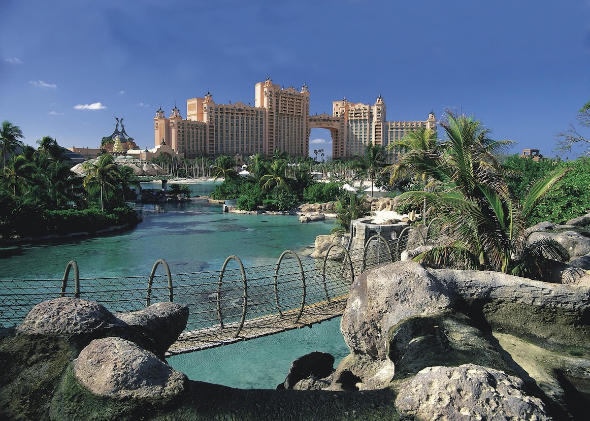 Tropical lagoon views with a dramatic resort backdrop and island-style charm
