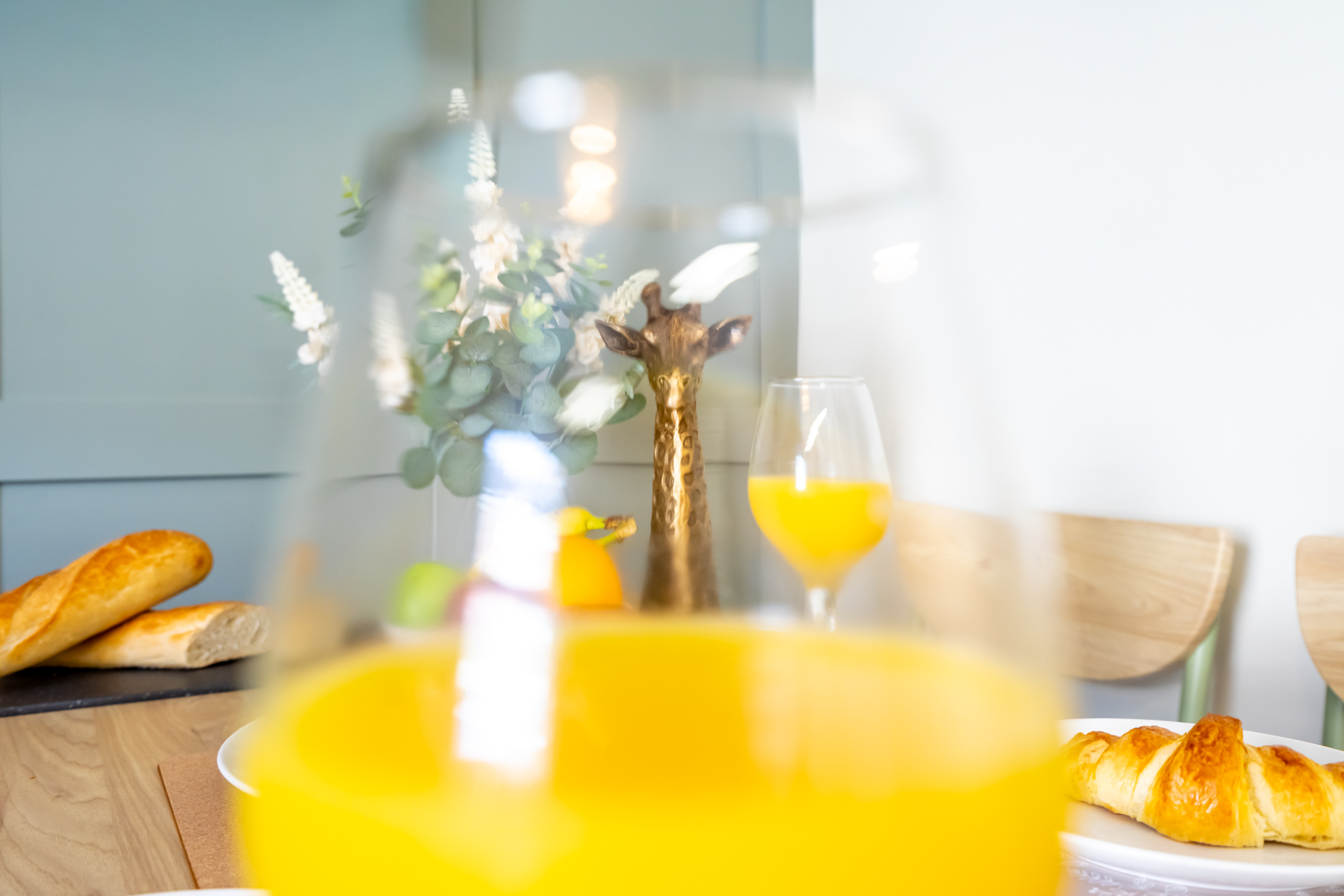 Bright breakfast nook with fresh pastries and a warm, inviting feel