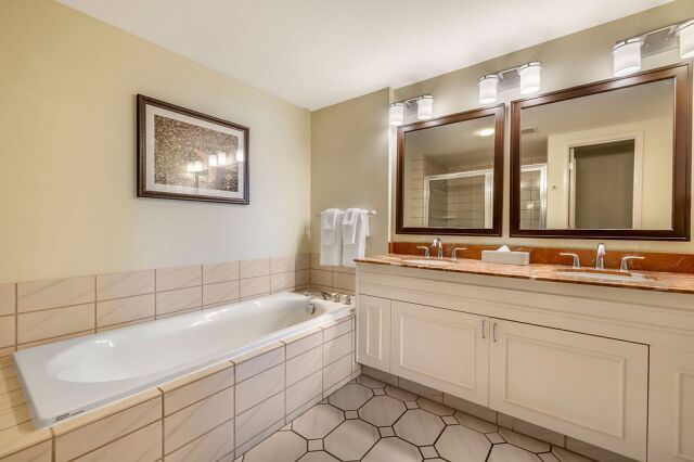 Relaxing bathroom with soaking tub and double vanity