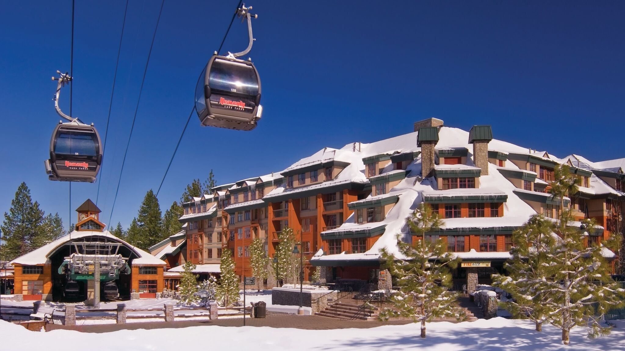 Ski-in/ski-out alpine lodge beside the gondola with stunning snowy views