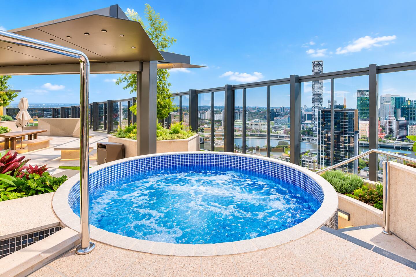 Rooftop Oasis: Soak in the views from the bubbling hot tub high above South Brisbane!