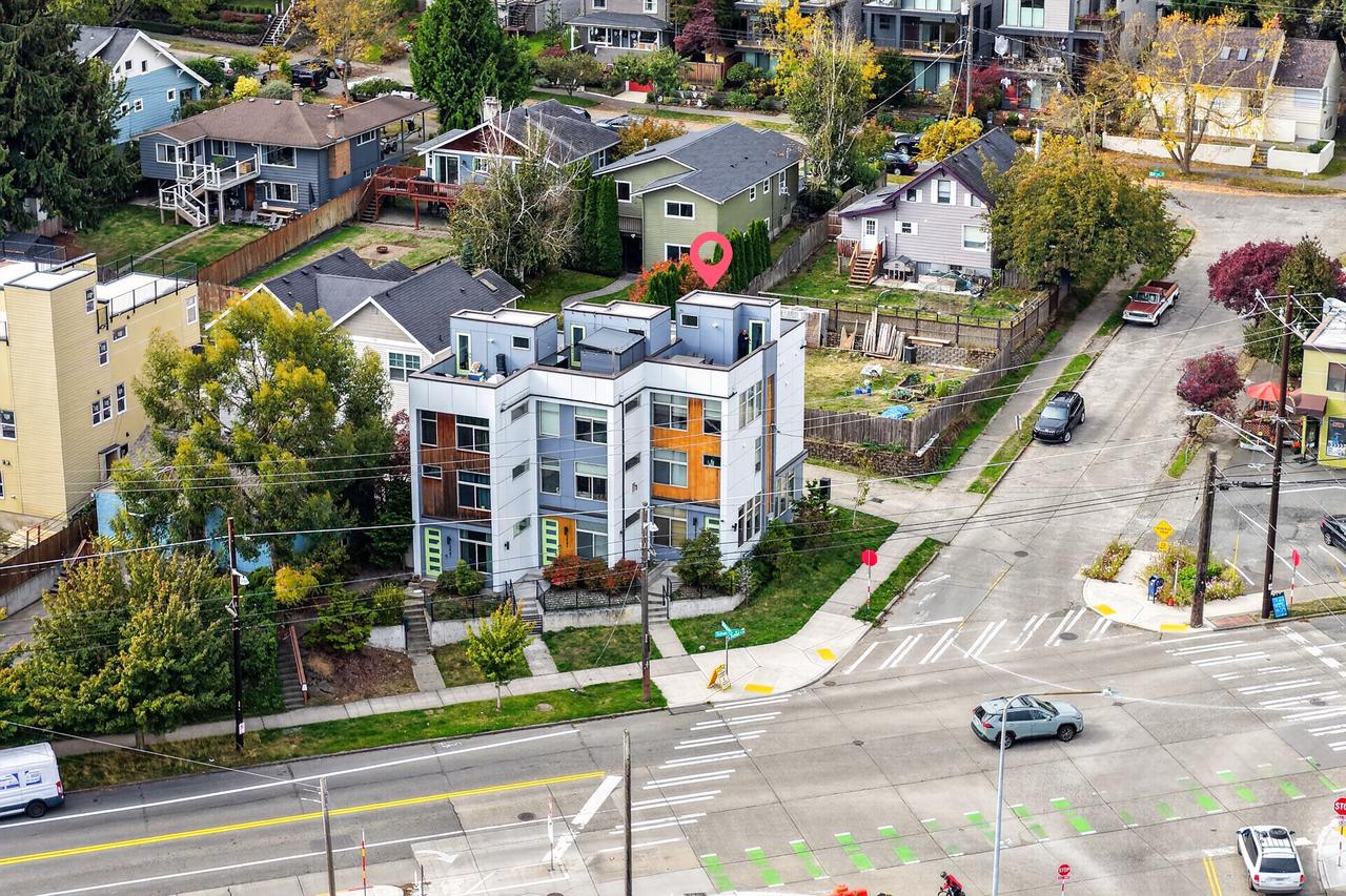 Modern corner property with striking design and great neighborhood access