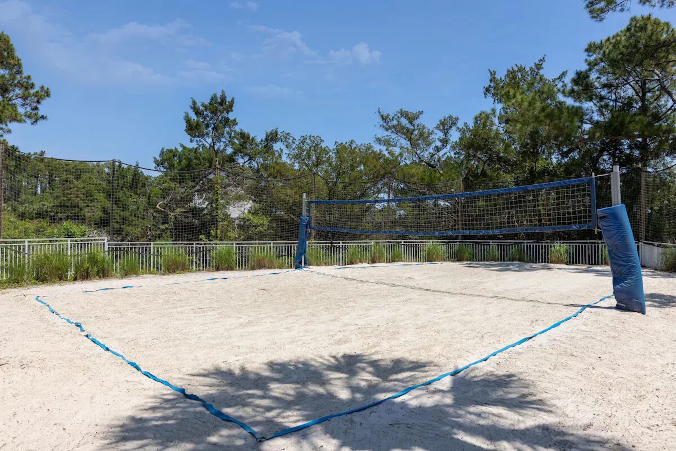 Private sand volleyball court for sunny outdoor fun