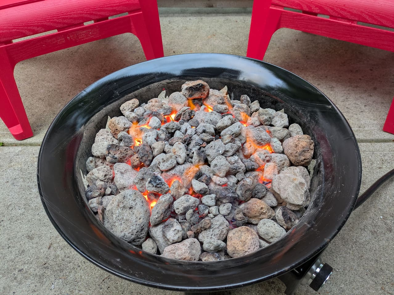 Fire bowl glowing in the forest at Blacktail Retreat, Halfmoon Bay