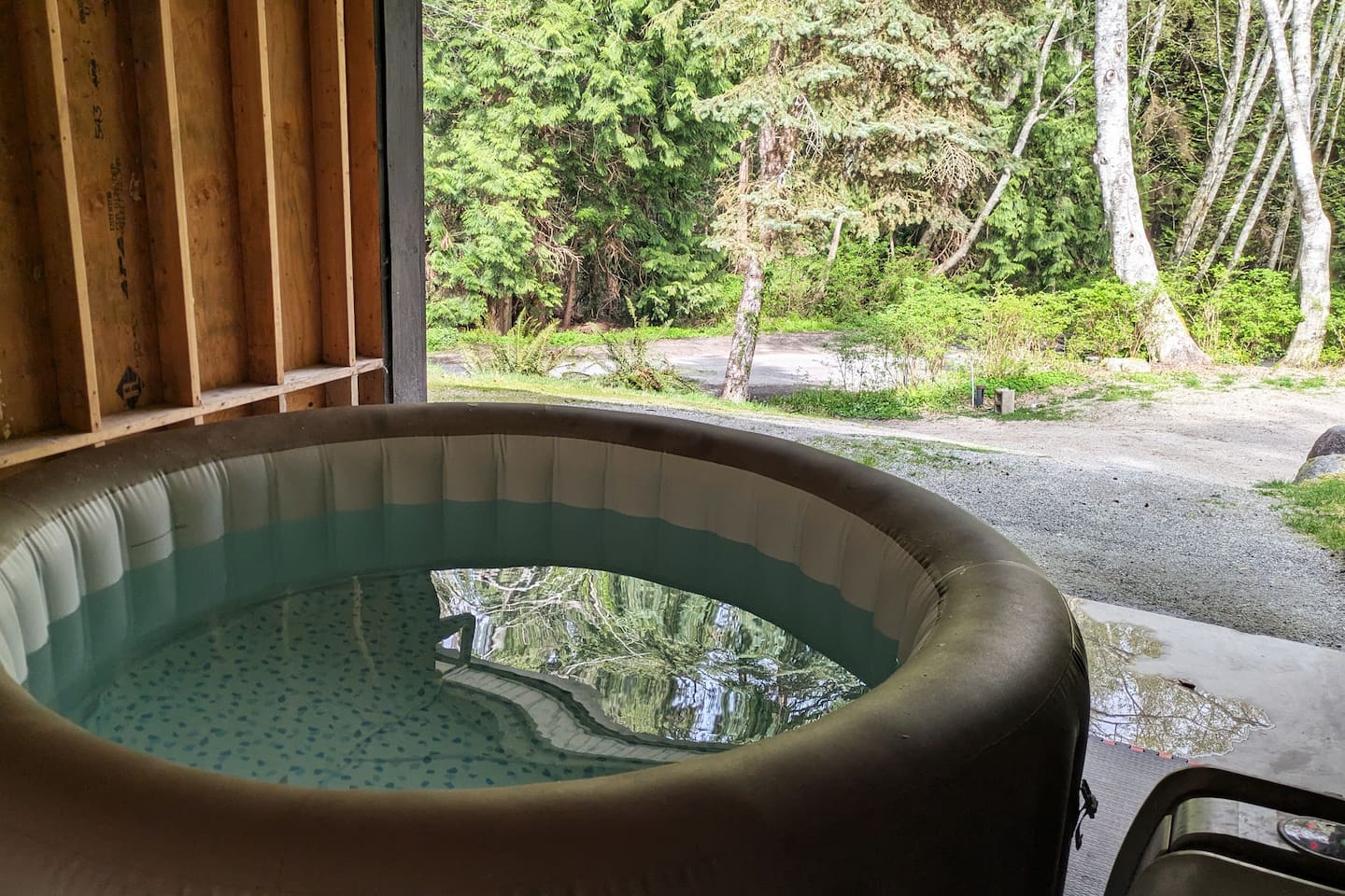 Private hot tub at Blacktail Cabin under the trees