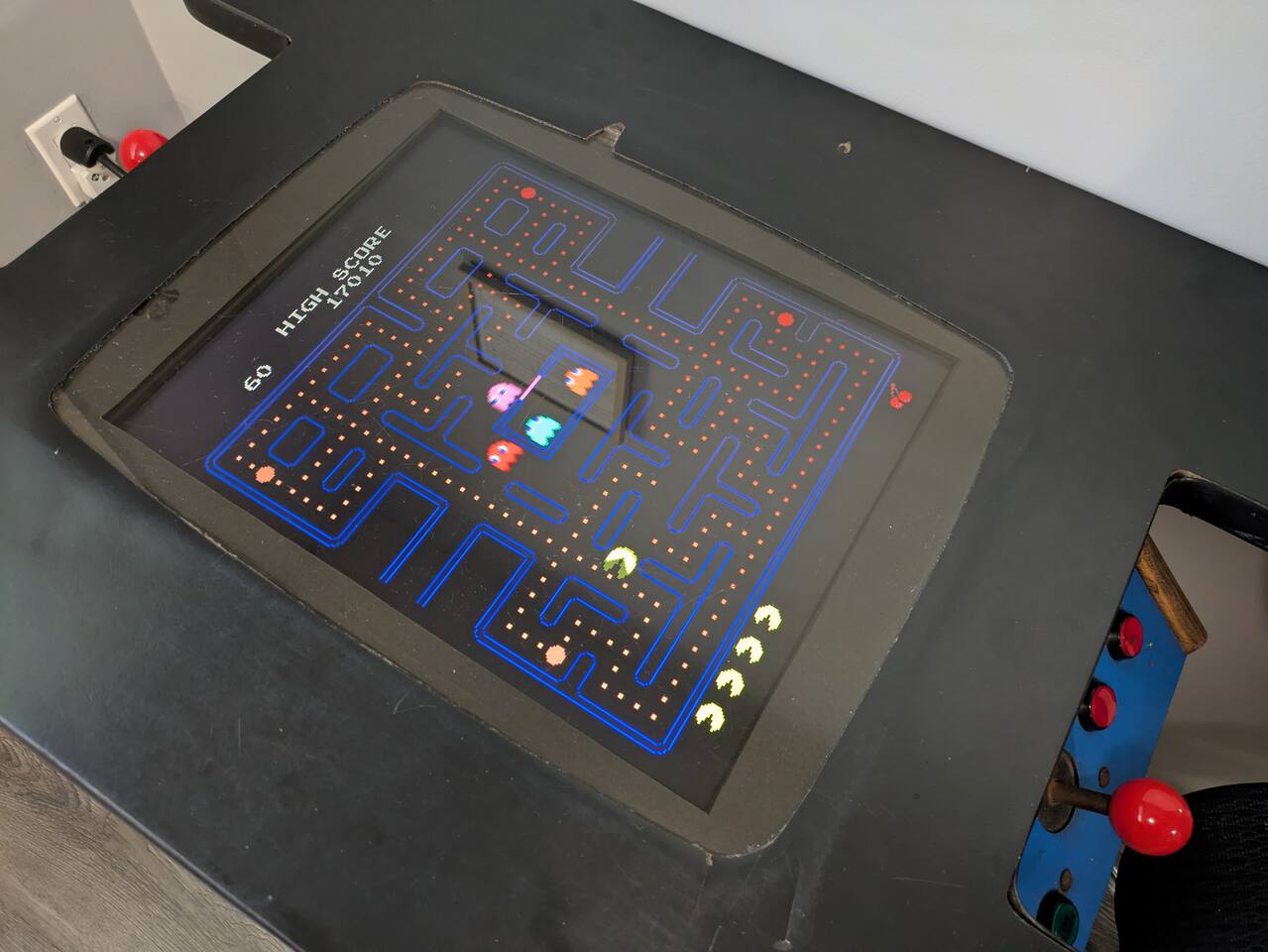 The cocktail arcade. There are 60 games including Pac-Man, Dig Dug, Galaga, Donkey Kong, and many more. No quarters required.
