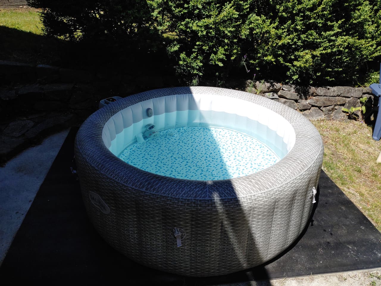 The four person hot tub is open to the sky in the summer and under a canopy in the winter. It is available for your private use year-round.